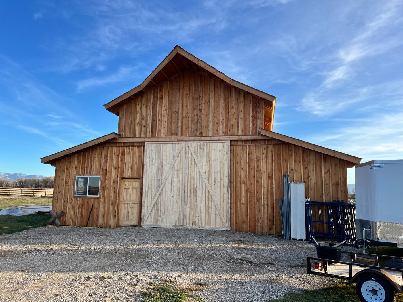 Post-frame barn with sliding doors
